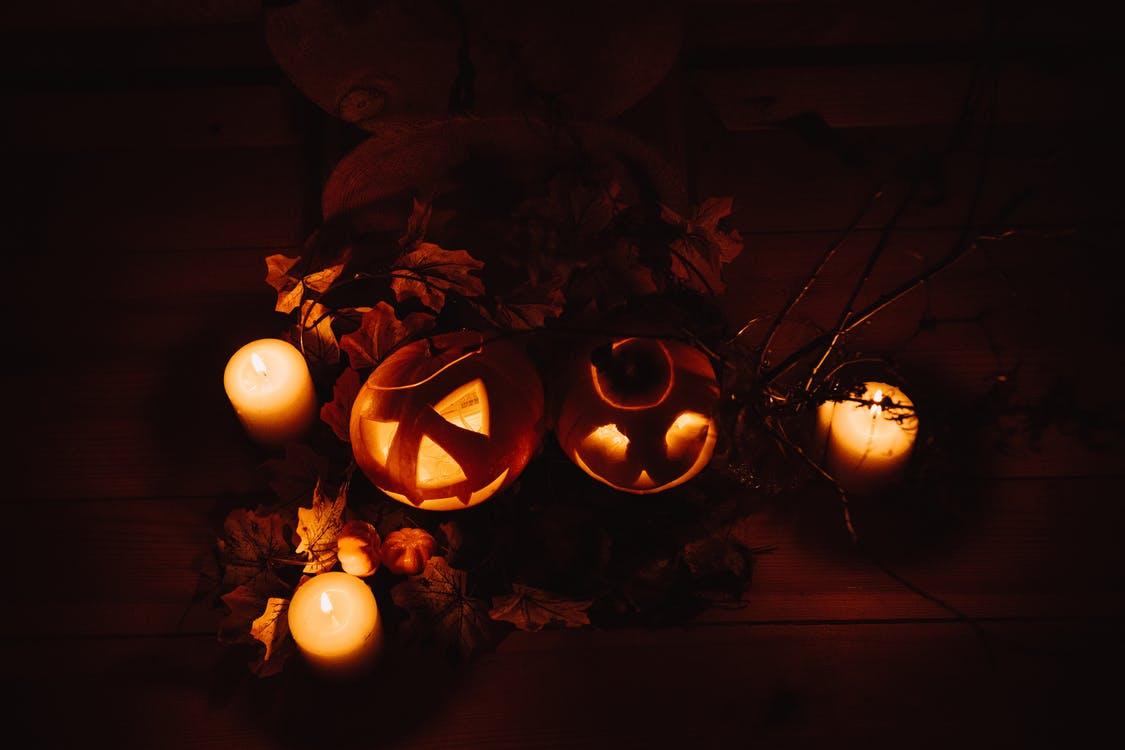 Jack O Lantern on Brown Wooden Table